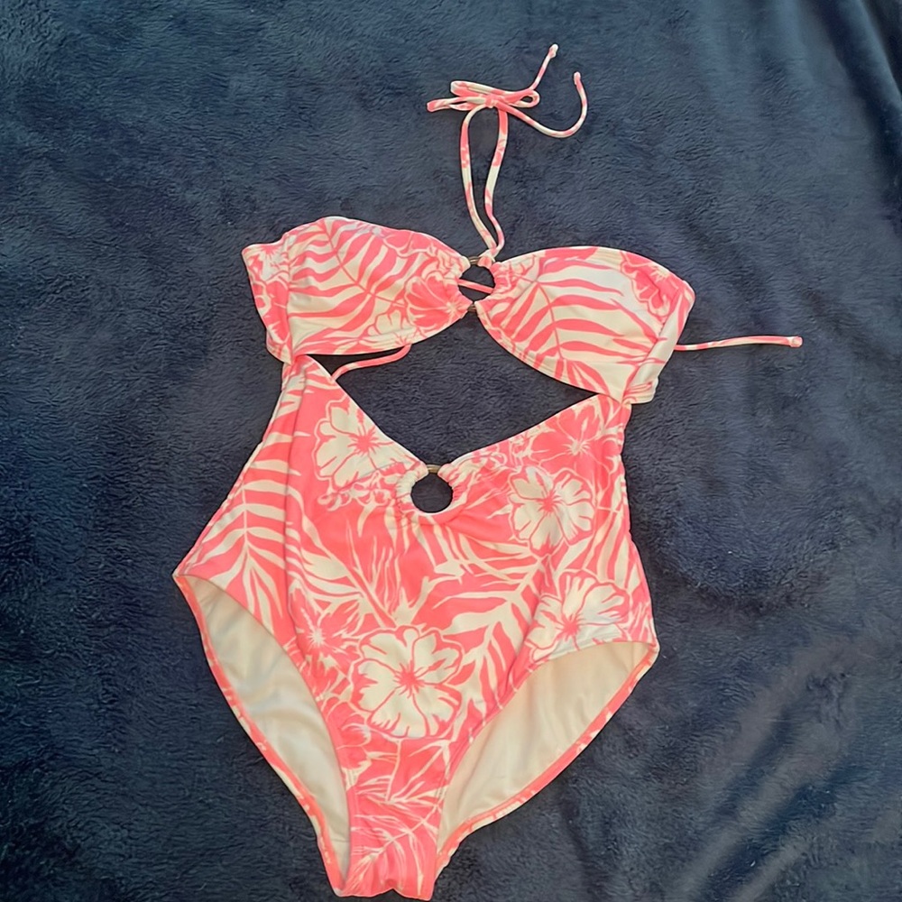 Bright pink flattering one piece. Size medium.